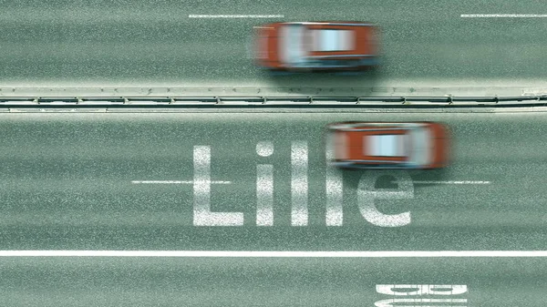 Vzdušný pohled shora na silnici s auty odhalující Lilleho titulek. Cestování autem ve Francii 3D vykreslování — Stock fotografie