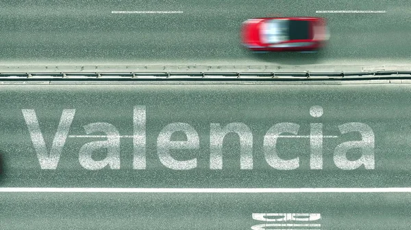 Widok z góry na dół autostrady z ujawniając tekst Walencja. Jazda w Hiszpanii renderowanie 3D — Zdjęcie stockowe