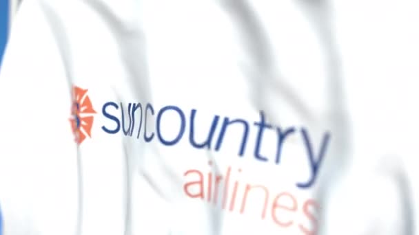 Размахиваю флагом с логотипом Sun Country Airlines, крупным планом. Передвижная 3D-анимация — стоковое видео