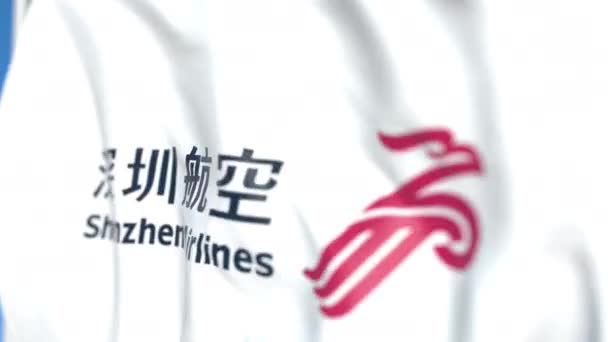 Flagge schwenkend mit dem Logo der Shenzhen Airlines, Nahaufnahme. redaktionelle loopable 3D-Animation — Stockvideo