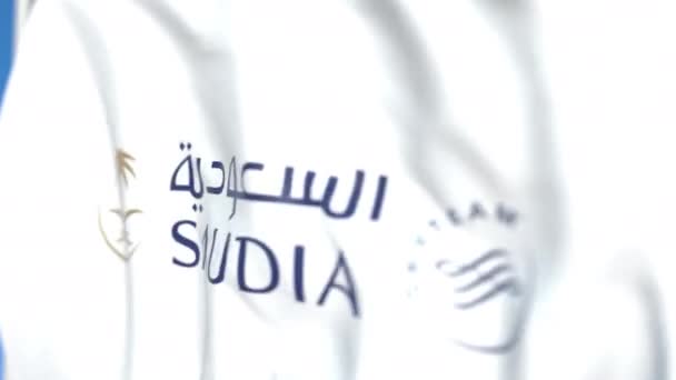 Размахиваю флагом с логотипом Saudia, крупным планом. Передвижная 3D-анимация — стоковое видео