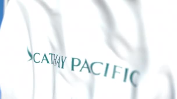 Viftande flagga med Cathay Pacific logo, närbild. Redaktionell loopable 3D-animering — Stockvideo