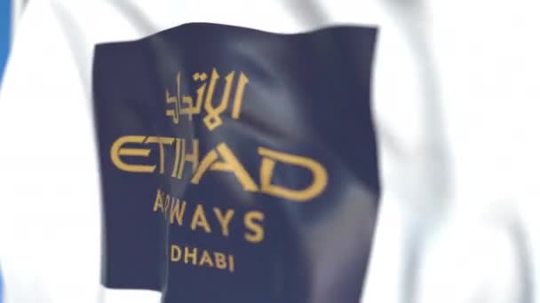 Drapeau arborant le logo Etihad Airways, gros plan. Animation 3D en boucle éditoriale — Video