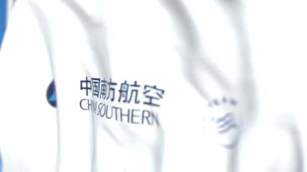 Waving flag with China Southern Airlines logo, close-up. Editorial loopable 3D animation — Stock Video