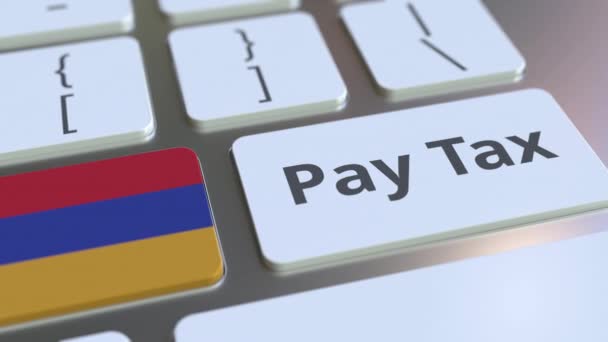 PAY TAX text and flag of Armenia on the buttons on the computer keyboard. Taxation related conceptual 3D animation — Stock Video