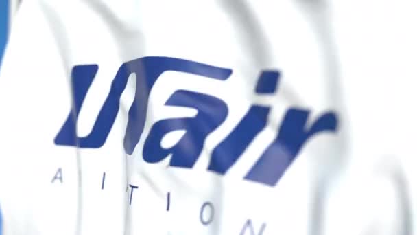 Bandera ondeando con el logotipo de Utair Aviation, de cerca. Animación en 3D loopable editorial — Vídeo de stock