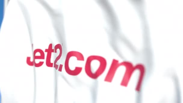 Flying flag with Jet2.com logo, close-up. Editorial loopable 3D animation — Stock Video