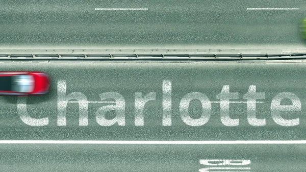 Pohled shora dolů po dálnici s textem Charlotte. Jízda ve Spojených státech 3D vykreslování — Stock fotografie