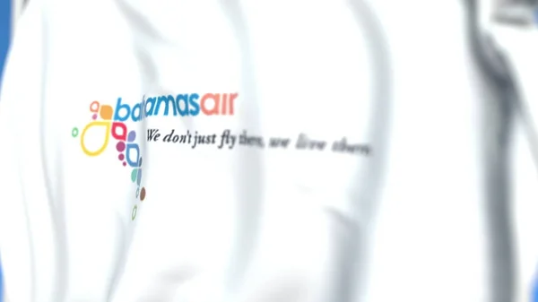 Drapeau arborant le logo Bahamasair, gros plan. Editorial rendu 3D — Photo