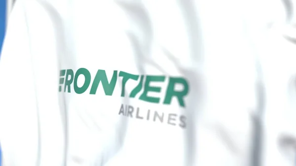 Bandera ondeando con el logo Frontier Airlines, primer plano. Representación Editorial 3D — Foto de Stock