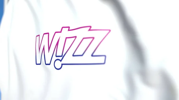 Bandiera sventolante con logo Wizz Air, primo piano. Rendering editoriale 3D — Foto Stock