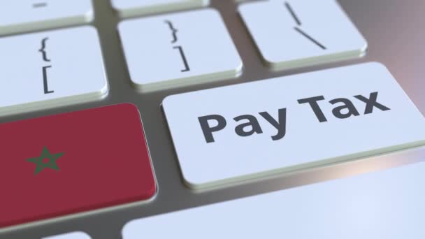 Tekst podatku Pay i flaga Maroka na klawiaturze komputera. Koncepcyjna animacja 3D związana z opodatkowaniem — Wideo stockowe