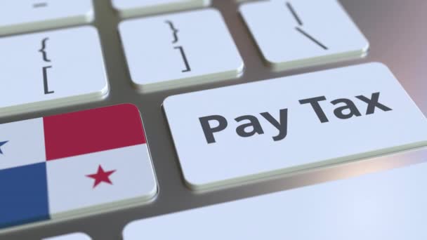 支付税文本和巴拿马国旗在计算机键盘上。税务相关概念 3d 动画 — 图库视频影像