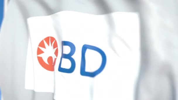 Létající vlajka s logem Bectona Dickinsona, zblízka. Redakční smykliatelná 3D animace — Stock video