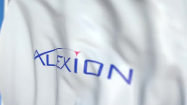 アレクシオン・ファーマシューティカルズのロゴが入った旗を振り、クローズアップ。エディトリアルループ可能な3Dアニメーション — ストック動画
