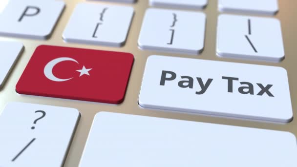 PAY TAX текст и флаг Турции на клавиатуре компьютера. Концептуальная 3D анимация — стоковое видео