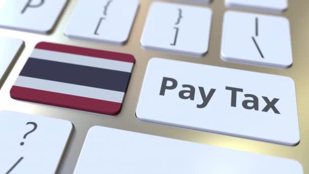 PAYER TAXE texte et drapeau de la Thaïlande sur le clavier de l'ordinateur. Animation 3D conceptuelle liée à la fiscalité — Video