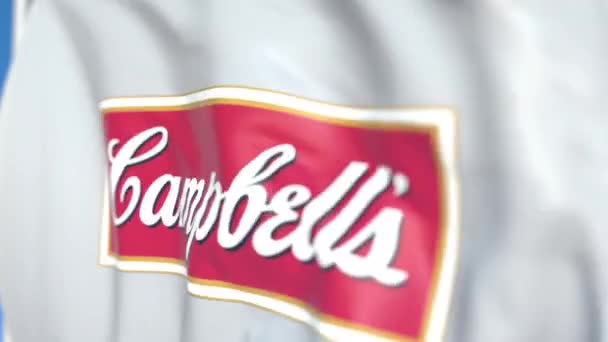 Bandeira voadora com logotipo da Campbell Soup Company, close-up. Editorial loopable animação 3D — Vídeo de Stock