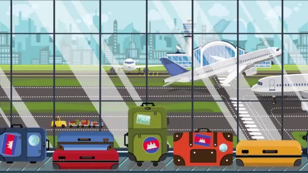 Malas com etiquetas de bandeira cambojana no carrossel de bagagem no aeroporto. Turismo no Camboja animação cartoon loopable conceitual — Vídeo de Stock