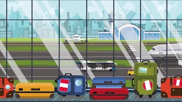 Bagages avec autocollants drapeau péruvien sur le carrousel de bagages à l'aéroport. Tourisme au Pérou animation de dessin animé bouclable conceptuel — Video