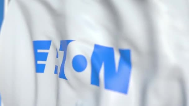 Flying flag with Eaton Corporation logo, close-up. Editorial loopable 3D animation — Stock Video