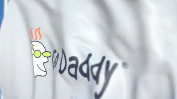 Viftande flagga med GoDaddy logotyp, närbild. Redaktionell loopable 3D-animering — Stockvideo