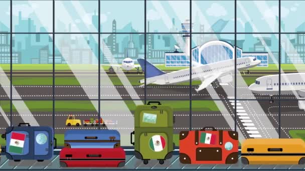 Valises avec autocollants drapeau mexicain sur le carrousel de bagages à l'aéroport. Voyage au Mexique liée animation de bande dessinée bouclable — Video