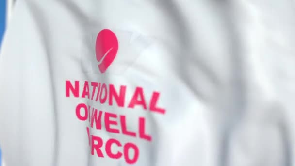 Размахиваю флагом с логотипом National Oilwell Varco, крупным планом. Передвижная 3D-анимация — стоковое видео