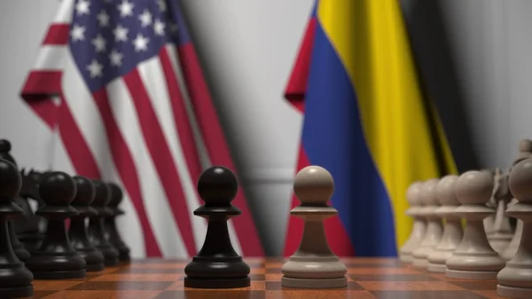 Zászlók az Egyesült Államok és Kolumbia mögött sakktábla. Az első gyalog mozog a játék kezdetén. Politikai rivalizálás fogalmi 3D renderelés — Stock Fotó
