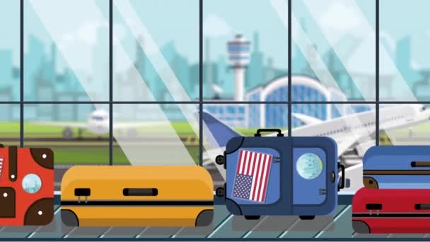 空港の手荷物カルーセルにアメリカ国旗のステッカーが貼った荷物、クローズアップ。宇佐観光関連のループ可能な漫画アニメーション — ストック動画