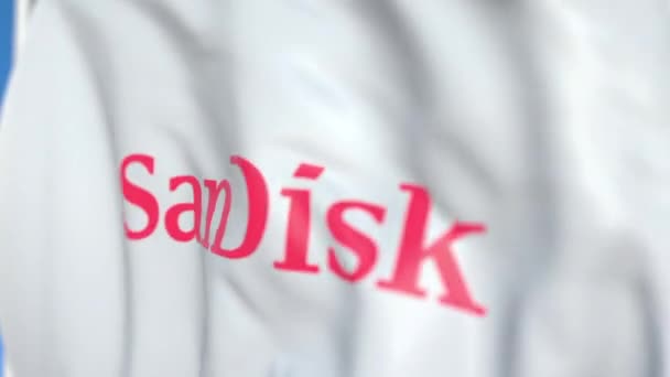 Létající vlajka s logem SanDisk, zblízka. Redakční smykliatelná 3D animace — Stock video