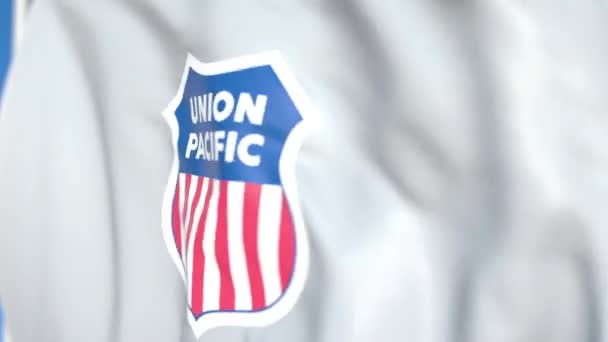 Mávnutím vlajky s logem Union Pacific, zblízka. Redakční smykliatelná 3D animace — Stock video