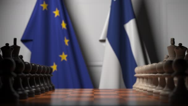 棋盘后面的欧盟和芬兰国旗。第一个棋子在游戏开始时移动。政治竞争概念3D动画 — 图库视频影像