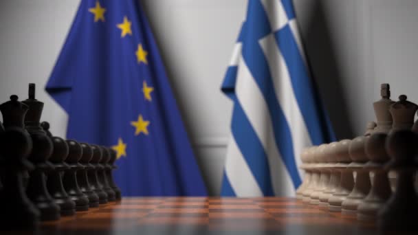 Bandiere dell'UE e della Grecia dietro la scacchiera. Il primo pedone si muove all'inizio del gioco. Rivalità politica concettuale animazione 3D — Video Stock