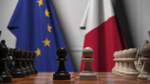 Bandiere dell'UE e di Malta dietro la scacchiera. Il primo pedone si muove all'inizio del gioco. Rivalità politica rendering concettuale 3D — Foto Stock