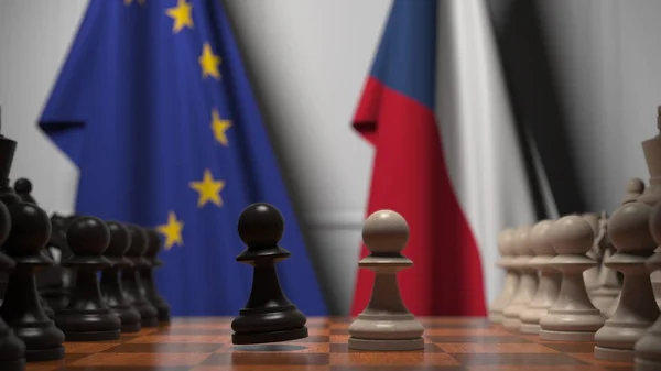 Bandiere dell'UE e della Repubblica ceca dietro scacchiera. Il primo pedone si muove all'inizio del gioco. Rivalità politica rendering concettuale 3D — Foto Stock