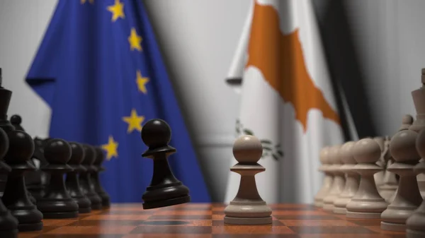 Bandiere dell'UE e di Cipro dietro la scacchiera. Il primo pedone si muove all'inizio del gioco. Rivalità politica rendering concettuale 3D — Foto Stock
