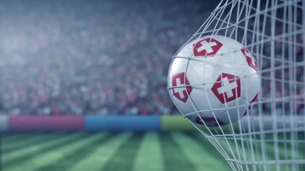 Bandera de Suiza en la pelota en la red de fútbol. Animación 3D conceptual — Vídeos de Stock