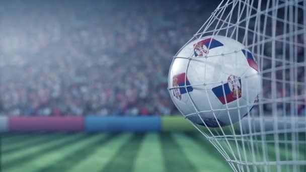 Flag of Serbia on the ball in football net. Conceptual 3D animation — Stock Video