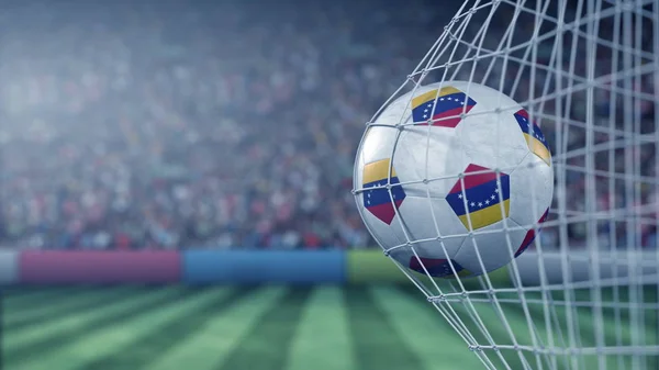 Flag of Venezuela on the football hitting goal net back. Realistic 3D rendering — Stock Photo, Image