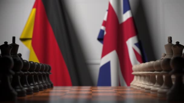 ドイツとイギリスの国旗に対して握手する政治家 — ストック動画