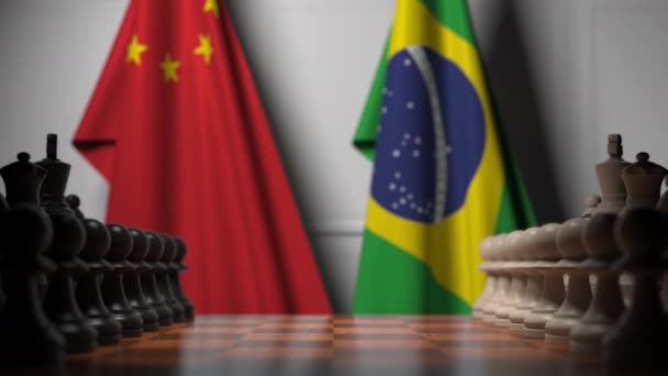 中国とブラジルの旗に対するチェスゲーム。政治競争関連3Dアニメーション — ストック動画