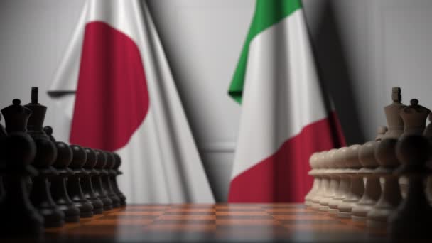 Juego de ajedrez contra banderas de Japón e Italia. Competencia política relacionada con la animación 3D — Vídeos de Stock