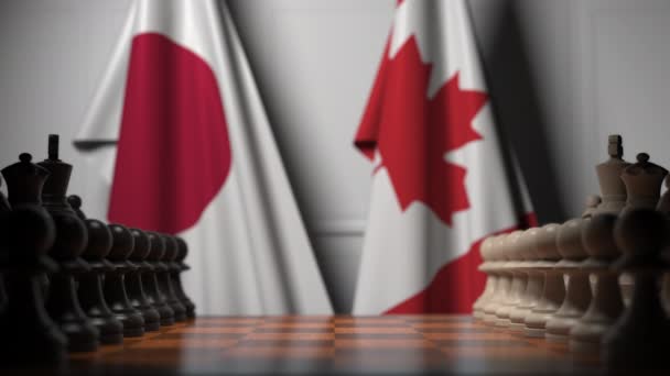 Permainan catur melawan bendera Jepang dan Kanada. Kompetisi politik terkait animasi 3D — Stok Video