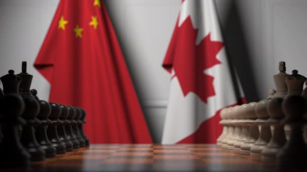 Chess game against flags of China and Canada. Political competition related 3D animation — Stock Video