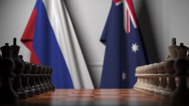 Schachspiel gegen Flaggen Russlands und Australiens. politische Konkurrenz im Zusammenhang mit 3D-Animation — Stockvideo