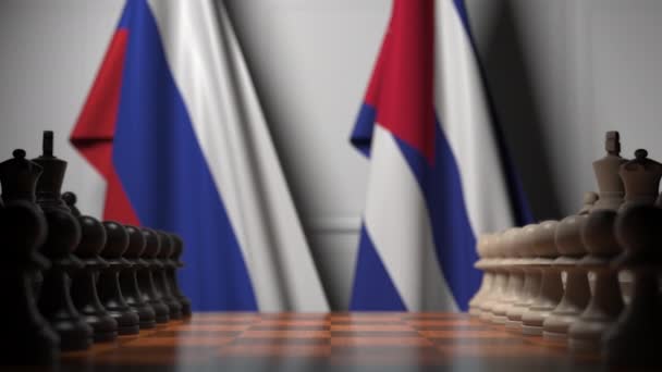 Bandeiras da Rússia e Cuba atrás de peões no tabuleiro de xadrez. Jogo de xadrez ou rivalidade política relacionada com animação 3D — Vídeo de Stock