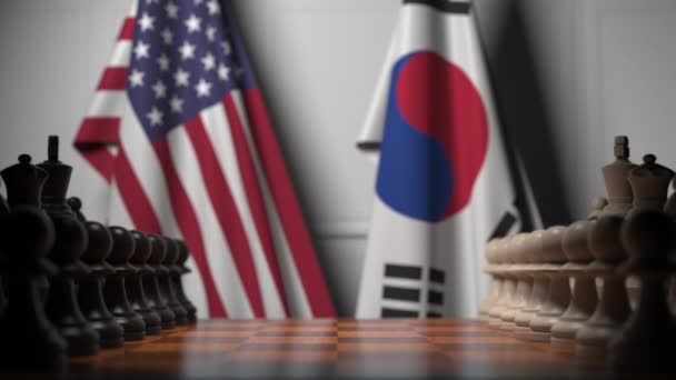 Juego de ajedrez contra banderas de USA y Corea del Sur. Competencia política relacionada con la animación 3D — Vídeo de stock
