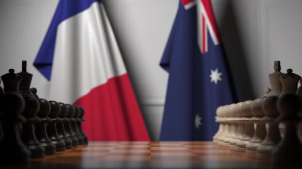 Juego de ajedrez contra banderas de Francia y Australia. Competencia política relacionada con la animación 3D — Vídeo de stock