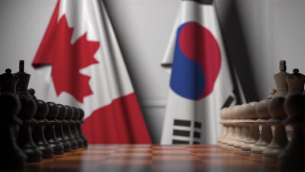 Gra w szachy z flagami Kanady i Korei Południowej. Animacja 3D związana z konkurencją polityczną — Wideo stockowe
